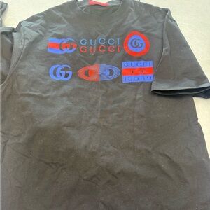 Gucci Black Tee with Vibrant Blue and Red Logos